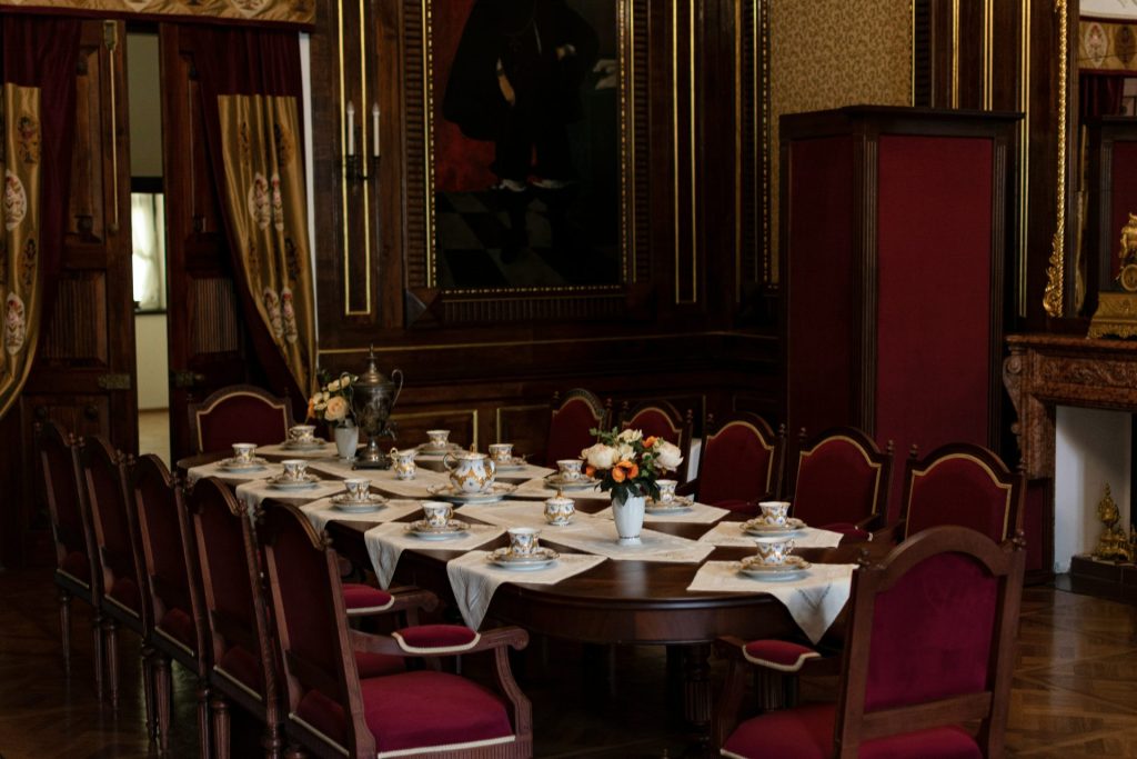 a dining room with a large mirror