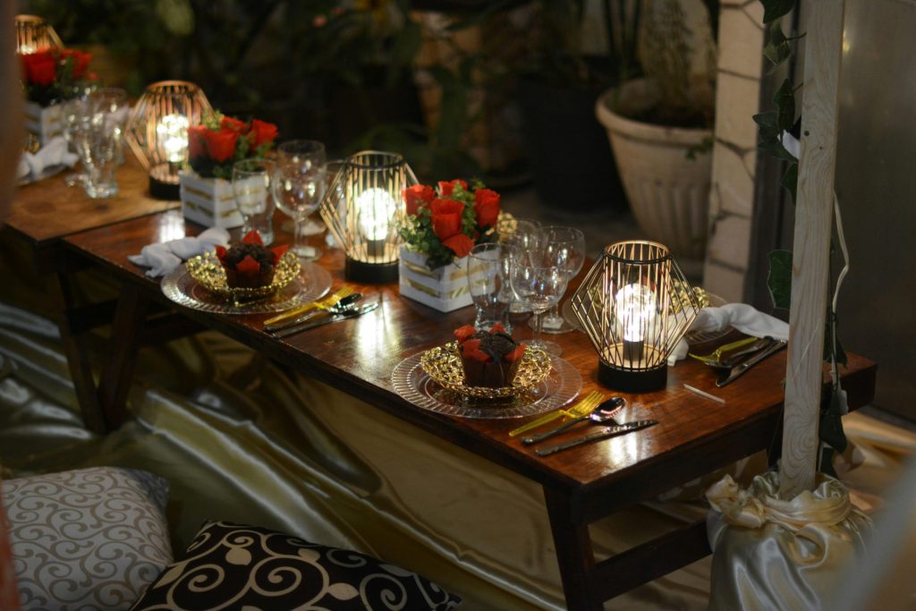 clear glass bowl on brown wooden table