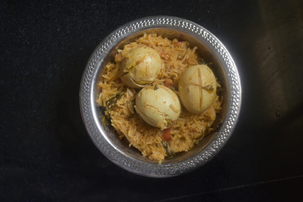 fried rice on stainless steel bowl